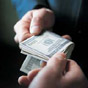 Сотрудник НБУ требовал $50 тысяч за валютную лицензию (фото)